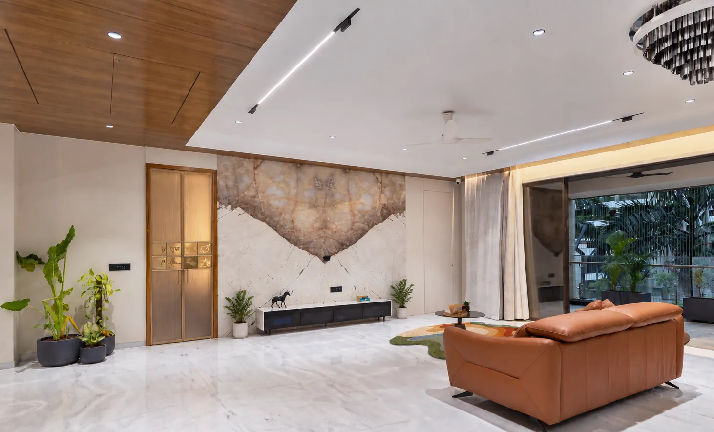 Elysium 5BHK — Foyer feature wall